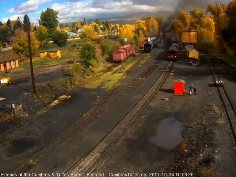 10-6-17  The locomotives are already clear of the yard as the parlor passes the tank.jpg