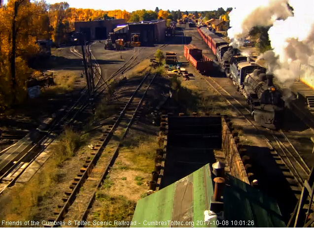 10-8-17  The 487 and 489 put out nice steam and smoke as they pass the wood shop.jpg