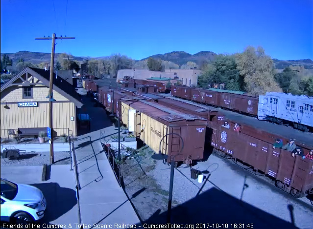 10-10-17  Again the riders in the open gon as it passes the depot.jpg