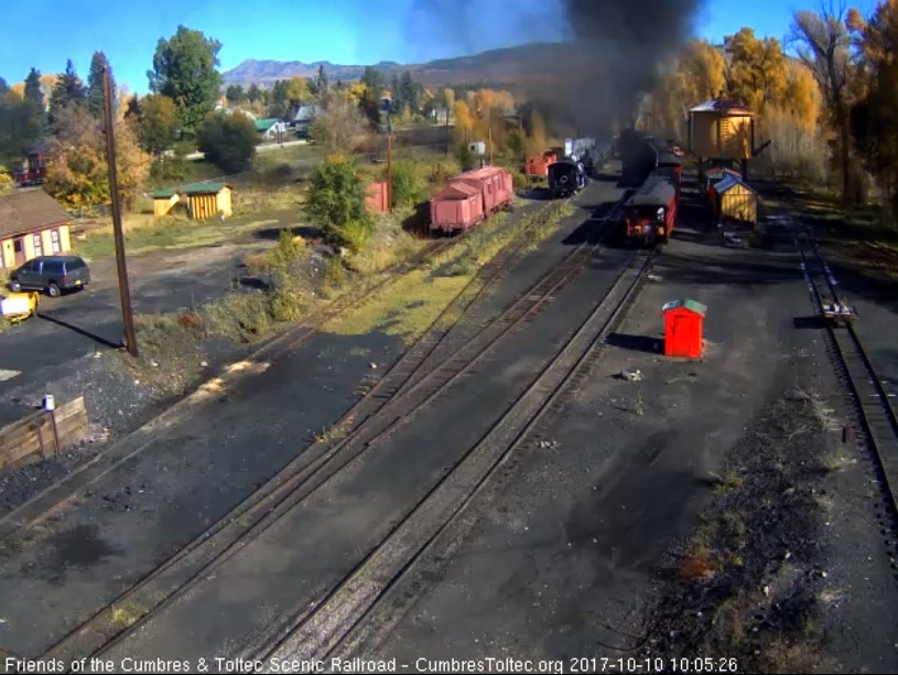 10-10-17  The locomotives are exiting Chama yard as the parlor passes the tank.jpg