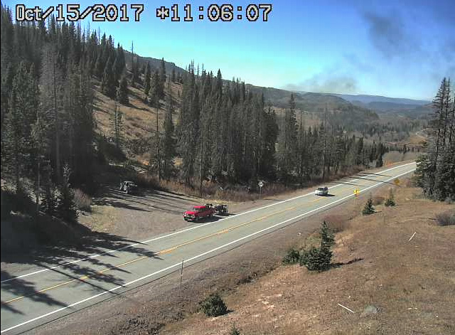 10-15-17 Its the wrong Cumbres cam to see the tracks but we have smoke drifting over the highway.jpg