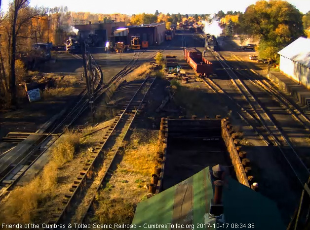 10-17-17 The hostlers have finished their morning job as one of them closes and locks the switch for the lead to the coal dock.jpg