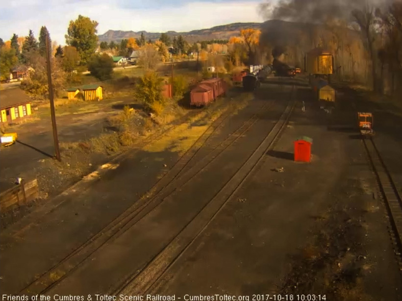 10-18-17 The train is now almost out of the yard as the speeder waits to get on the main.jpg