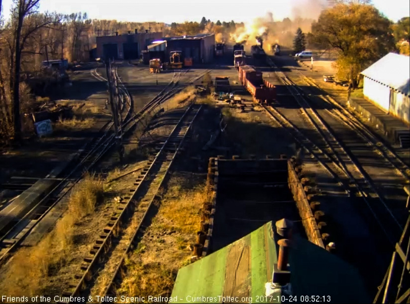 10-24-17  The 463 is now on the south yard lead while 487 has coupled to the caboose and 2 hoppers.jpg