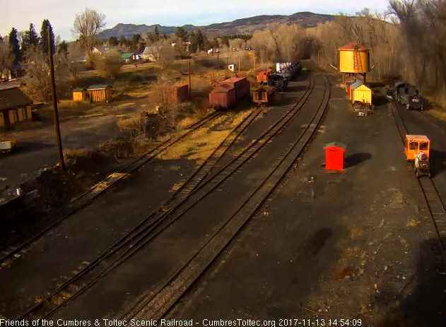 11-13-17 Fired cleaned, the 489 heads to the tank with one of the hostlers riding on the tender deck.jpg