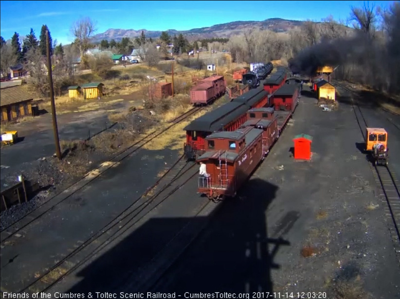 11-14-17 The conductor is on the back caboose platform as the train heads east.jpg