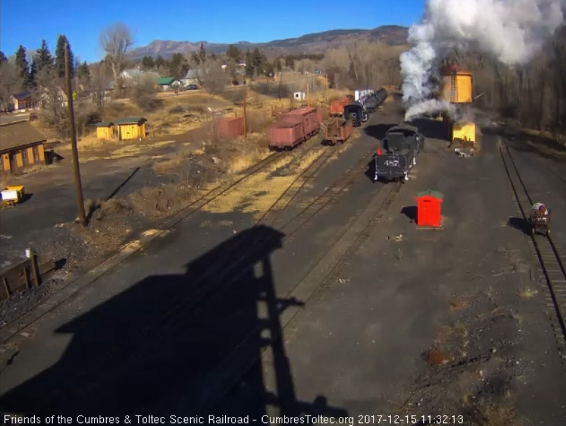 12-15-17 Passenger cars moved, the 487, with red flag flying, heads out of Chama.jpg