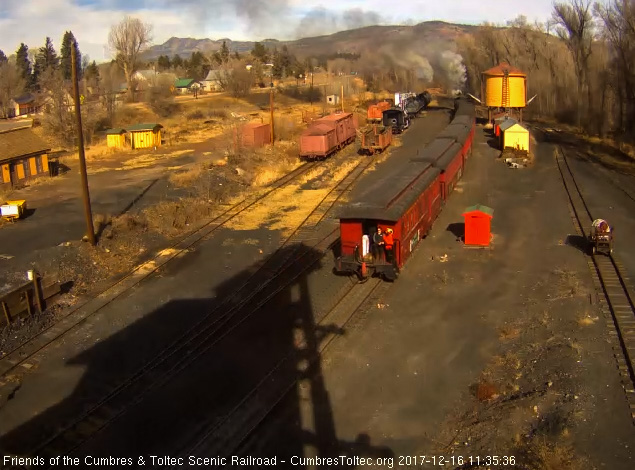 12-16-17 Riders on the back of the cafe car as train 2 heads out of Chama.jpg