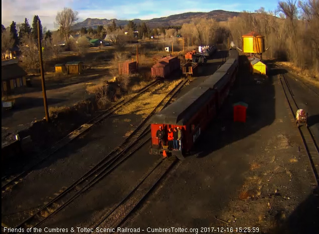 12-16-17 The sun is getting low in the Chama sky as the 4th train returns with a full cafe platform.jpg