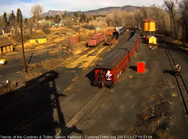 12-17-17 Train 1 backs into Chama with Santa on the cafe platform along with the conductor.jpg