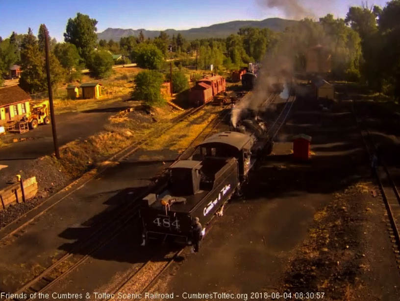 2018-06-04 After getting water, the 484 backs toward the coal dock lead.jpg