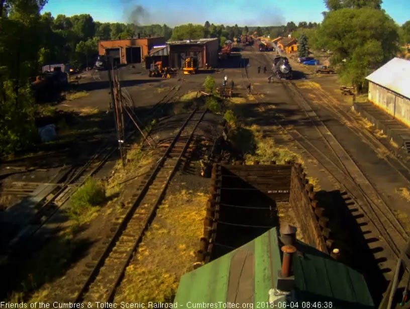 2018-06-04 One of the hostlers resets the switch into the coal lead as the road crew gets ready to climb aboard_.jpg