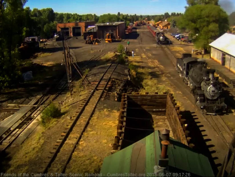 2018-06-07 The 484 has pulled the 9 car train into loading positioni as 488 backs down.jpg