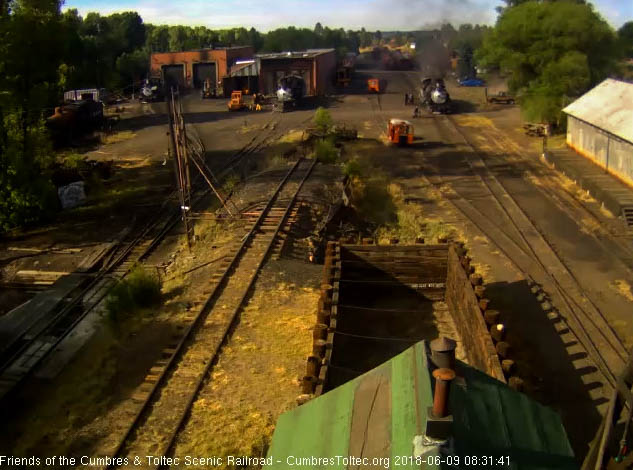 2018-06-09 The hostlers are finished getting 484 ready and the road crew walks to the locomotive.jpg