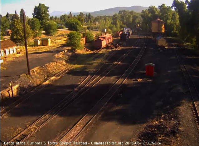 2018-06-12 As the train rounds the curve north of the yard, the sun glints off the side of the RGS reefer.jpg