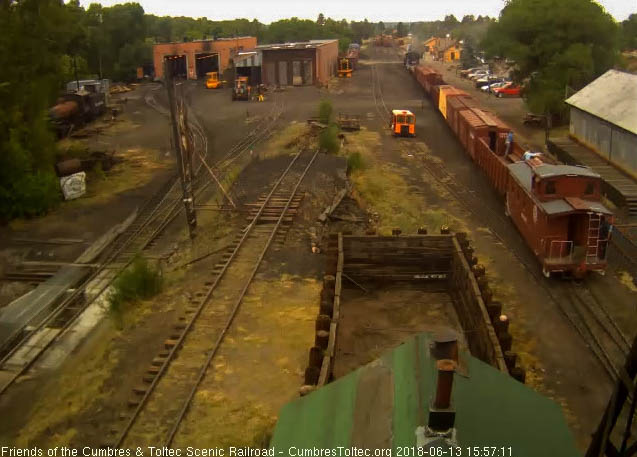 2018-06-13 The conductor is on the caboose platform checking his train.jpg