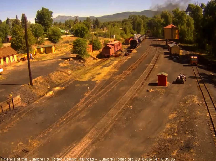 2018-06-14 The last cars of this morning's train are rounding the curve north of the yard.jpg