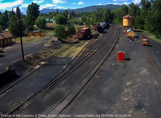 2018-06-14 The headlight of the 484 shines out as train 215 arrives in Chama.jpg