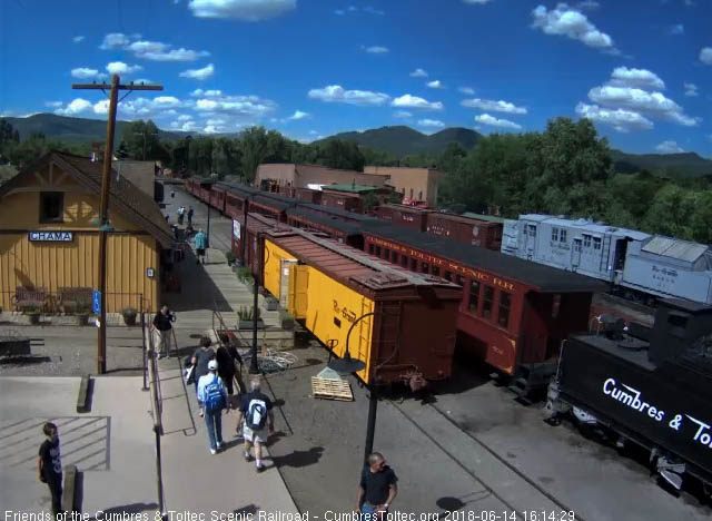 2018-06-14 Train stopped, ride over and some passengers mill about.jpg