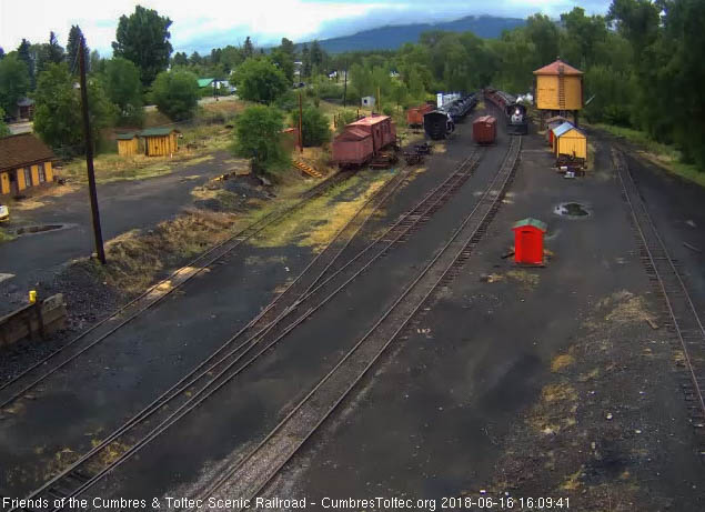 2018-06-16 The 487 is passing the tank as it heads to the depot.jpg