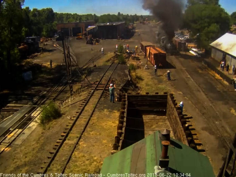2018-06-22 The train is envoloped in smoke as the 484 and 487 work to get their 13 car train moving.jpg