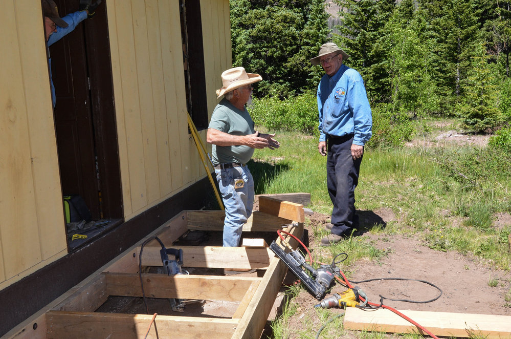 2018-06-20 Conferring over the new stoop at the car inspectors house.jpg