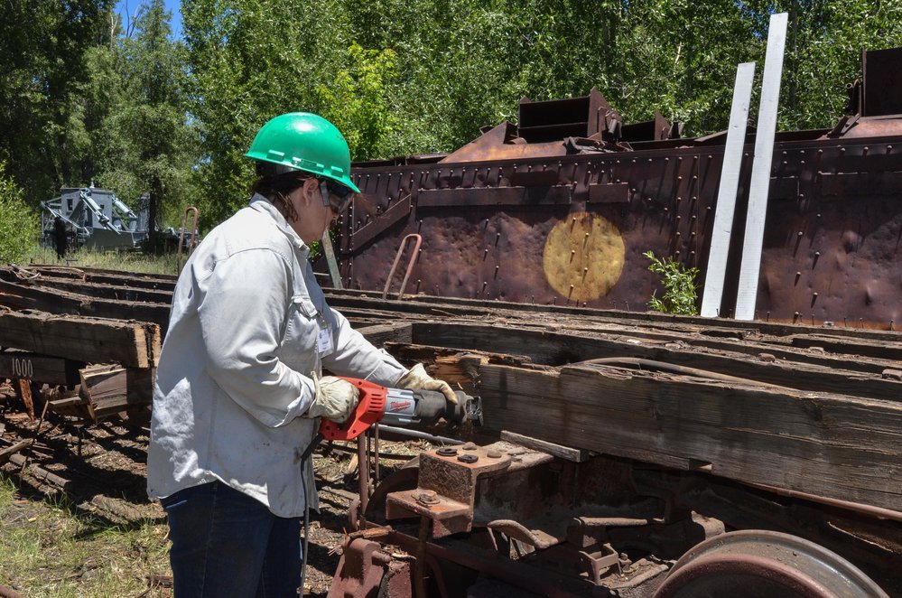 2018-06-25 The high sided gon that came down to the swamp in C is getting taken apart.jpg