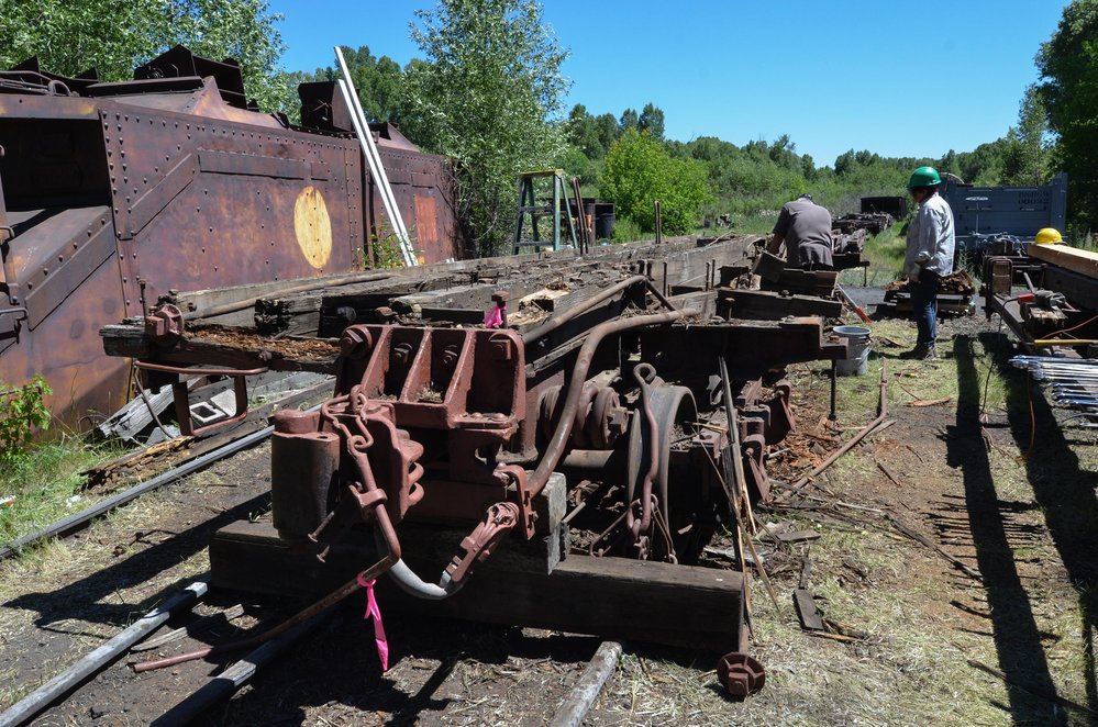 2018-06-25 Have a feeling that once the crew is done on this high sided gon, all that will be left is the trucks.jpg