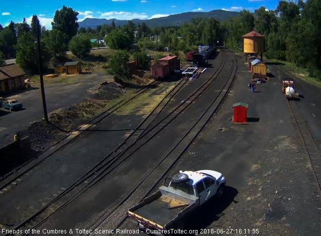 2018-06-27 The headlight of 484 shines out as train 215 enters Chama.jpg