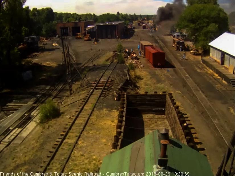 2018-06-29 The 487 is working to get the 8 car train 216 moving.jpg