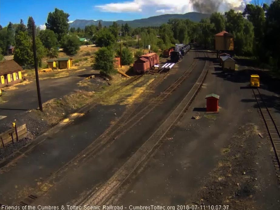2018-07-11 The last cars are rounding the curve as the train heads east.jpg