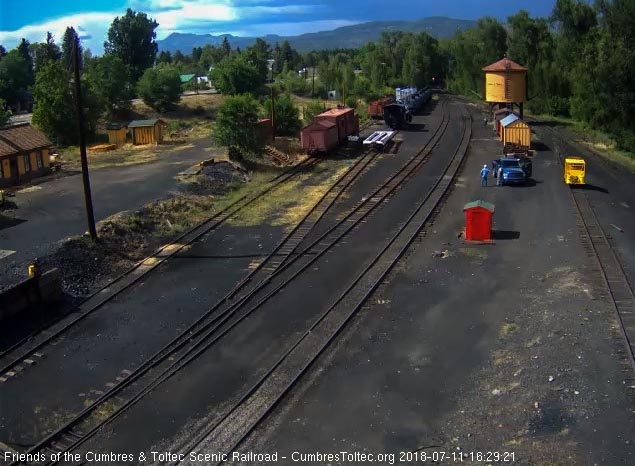 2018-07-11 The 484 has come around the curve and we see its headligh as it approaches Chama.jpg