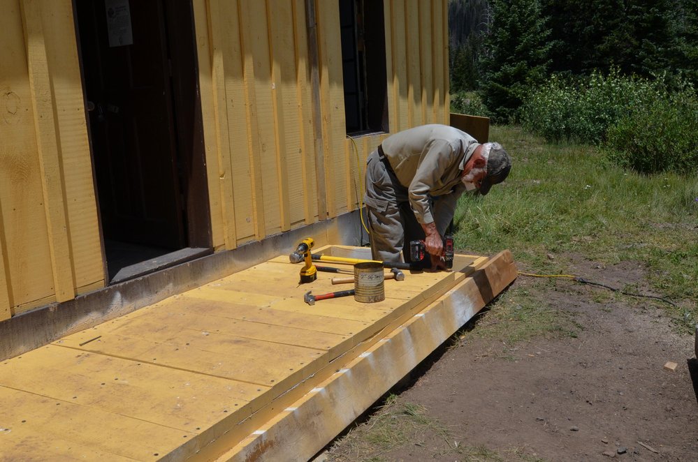 2018-07-24 Porch decking is going in at the car inspectors house at Cumbres.jpg