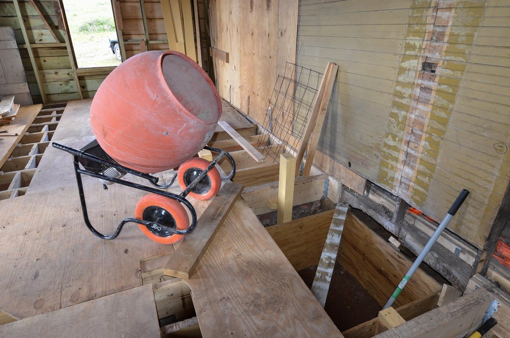 2018-07-26 Now that the form is in place, the mixer is ready to add concrete_.jpg