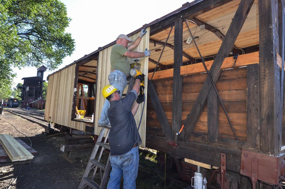 2018-07-26 Work continues on box car 3476 as the sheathing goes up.jpg