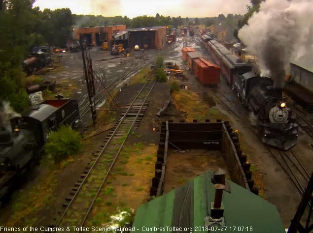2018-07-27 You can just see the yellow hard hat of a hostlers as he checks the train as it passes.jpg