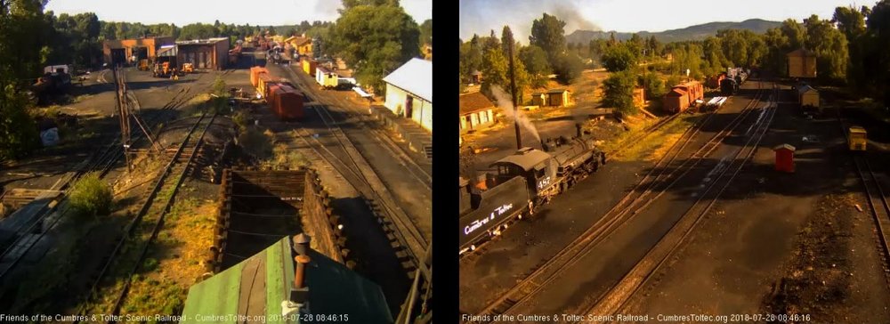 2018-07-28 The loader is starting to dump a bucket load into the tender of 487 as 463 heads into south yard.jpg