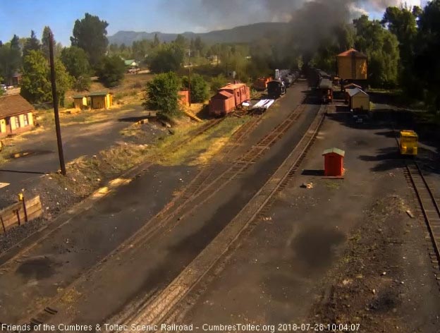 2018-07-28 The parlor Colorado is passing the tank as the locomotives exit the yard.jpg