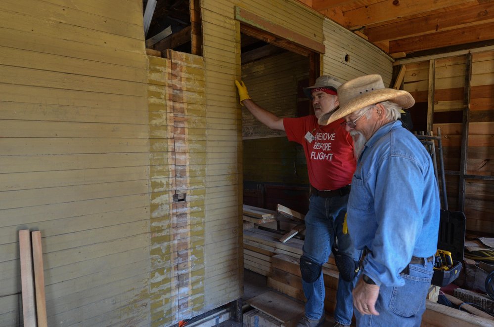 2018-07-28 Looks like they are thinking about the next step in rebuilding the fireplace.jpg