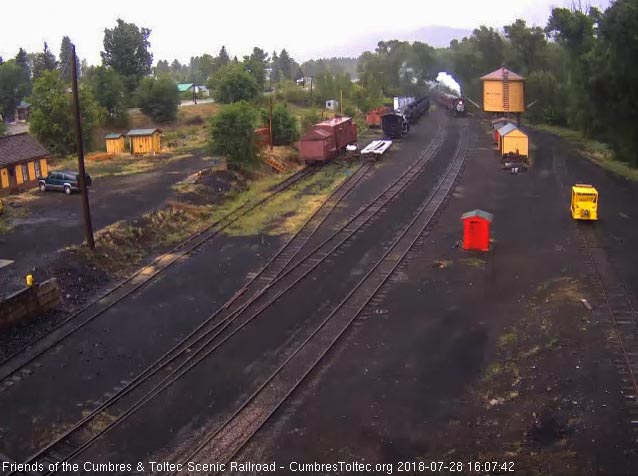 2018-07-28 The 484 brings a 9 car train 215 into rainy Chama.jpg