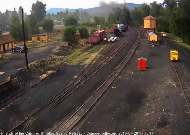 2018-07-28 The train has cleared the yard as we see 2 speeders ready to follow.jpg