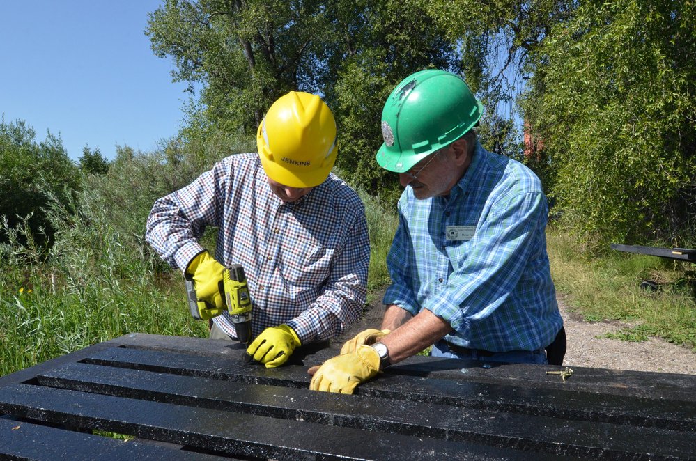 2018-07-30 Work continues in the 'swamp' on sheep car 5674 as what looks like a door is constructed.jpg