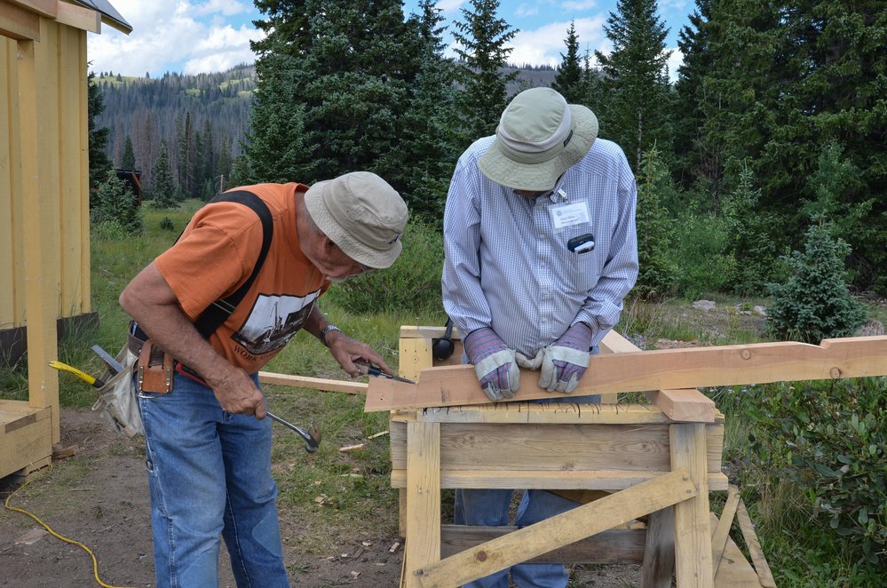 2018-07-30 Notching the boards for the roof supports at the car inspectors house.jpg