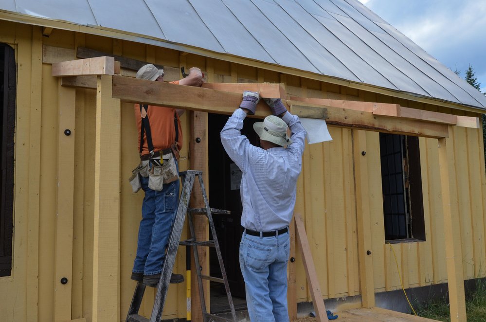 2018-07-30 Installing the board on the porch roof.jpg