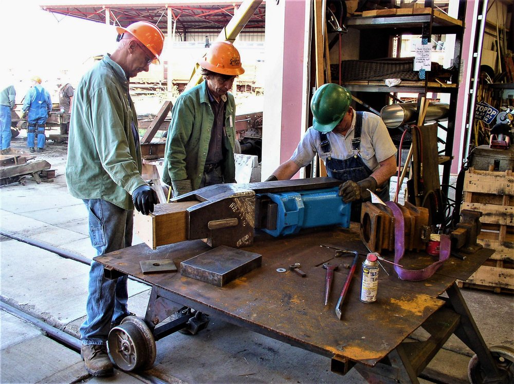 2018-07-31 Working on a new coupler pocket assembly for one of the tank car rebuilds.jpg