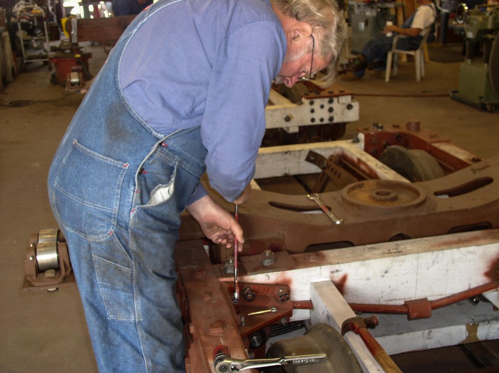 2018-08-01 Work continues on the construction of the period passenger car trucks.jpg