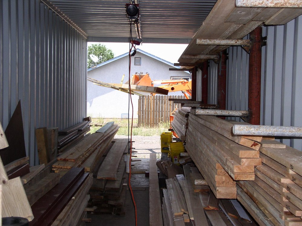 2018-08-01 Bringing some lumber into the conex storage.jpg