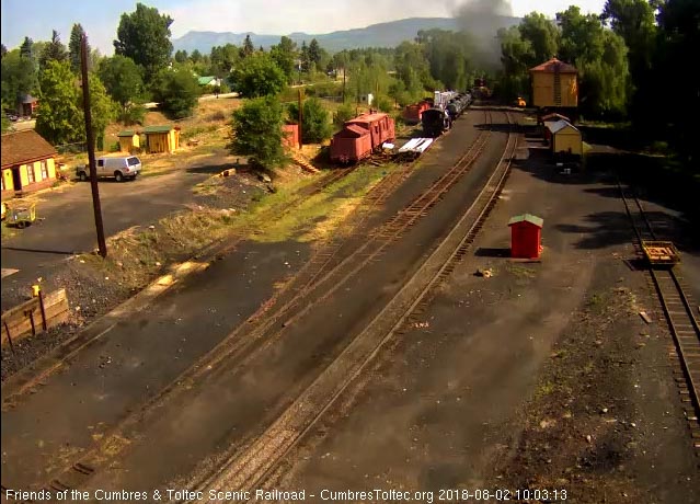 2018-08-02 The last cars round the curve at the north end of the yard as the train heads east.jpg