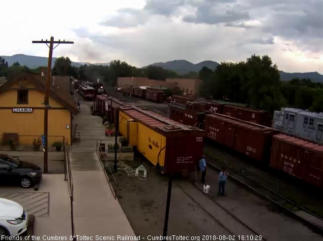 2018-08-02 The 2 cleaners wait as the train passes the exhibit train.jpg
