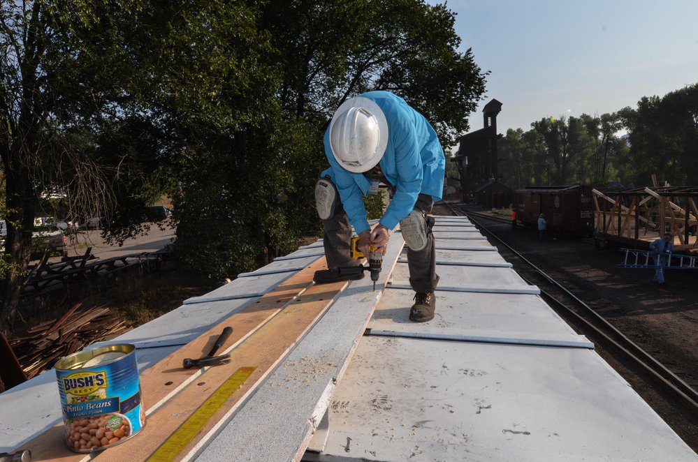 2018-08-02 Getting the roof walks mounted on the paint car.jpg